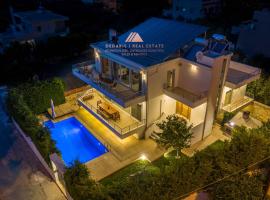 Luxury Villa Loutraki with private heated pool, beach rental in Loutraki