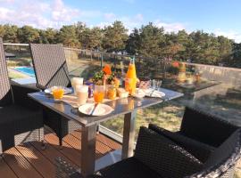Avella "Sundowner" mit Meerblick, Innenpool und eigener Wallbox, Hotel in Binz