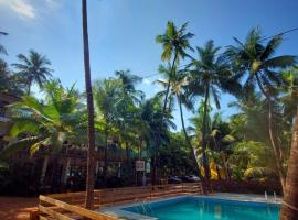 Coconut Garden Beach House, hotel v mestu Malvan