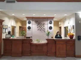Merit Hotel & Suites