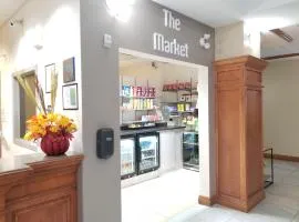 Merit Hotel & Suites