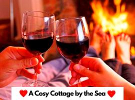 Fisherman's Cottage - The Ultimate Romantic Lakeside Cottage just a few steps from the Beach! Relax with a glass of wine & Snuggle up to the Cosy Log Burner at the BEST Location in Mablethorpe! It's Pet Friendly too!, viešbutis mieste Mablethorpe