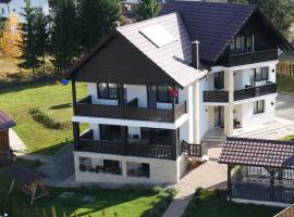 Aqualina Colibita - pe malul lacului, alojamento na praia em Colibiţa