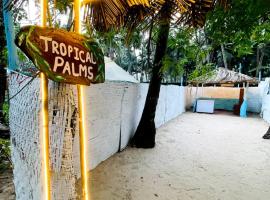 Tropical palms, hotel near Agonda Beach, Palolem