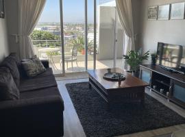 104 Horizon Bay Bloubergstrand, hotel con campo de golf en Bloubergstrand
