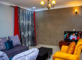 Secure cozy getaway near Kampala business district, apartment in Kampala