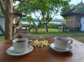 Pasir Putih Cottage - Menjangan, hotel in Banyuwedang