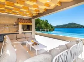Beachfront Villa BrulupeS in secluded bay