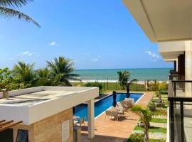@Paradise_Bahia-Village Novo 2 Suítes Pé na Areia e Vista Mar em Itacimirim, hotell i Itacimirim