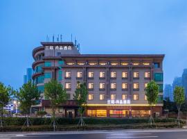 LanOu Hotel Qingdao Golden Beach Scenic Area, 3 žvaigždučių viešbutis mieste Huangdao