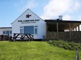 The Lobster Pot Cottage Church Bay – hotel w mieście Llanrhyddlad