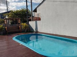 casa piscina pinheira -sc, hotel em Palhoça