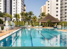 RIVIERA DE SÃO LOURENÇO - CONDO ACQUA A 0,5 MINUTO DA PRAIA - estilo resort! Apto com ar condicionado e wifi, hotel in Riviera de São Lourenço