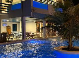 Pousada La Grécia, hotel u gradu Kamosim