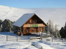 Zirbenhütte am Falkert auf der Heidi-Alm