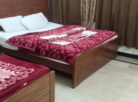 New Hotel Grand Faisalabad, hotel en Rawalpindi