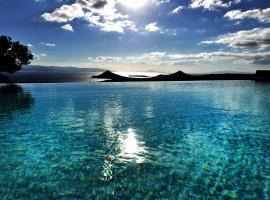 Villa Acqua · Gorgeous pool villa, stunning sea views, helipad!, beach rental in Parasporos
