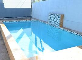 NEW Remodeled pool house 2 minutes from beach, strandleiga í Loiza