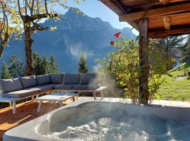 Gstaad Paradise View Chalet with Jacuzzi ลอดจ์ในRougemont