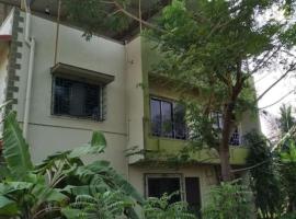 Gulmohar Cottages - Home Stay in Alibag, habitación en casa particular en Alibaug