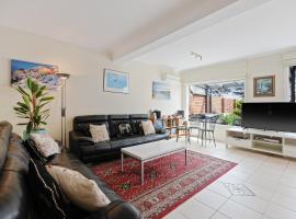 Black Dolphin Waterfront Apartment, holiday rental in San Remo