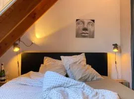 Gastenverblijf Chambre dAmis - Geniet van Haspengouw, buiten én binnen!