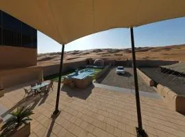 Sand House、Al Rakaのコテージ