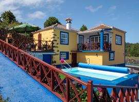 CASA ALBA, casa rústica en la colina con piscina-spa climatizada y vistas al mar, hotell i Puntallana