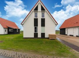 Modern holiday home by the sea with sauna, готель біля визначного місця Nature preservation 'De Pluimpot', у місті Scherpenisse