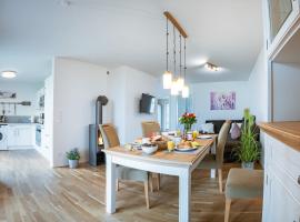 Fewo MEERwert by Seeblick Ferien ORO, Familienfreundlich, Sauna, Kamin,XL Dusche, ξενοδοχείο σε Olpenitz
