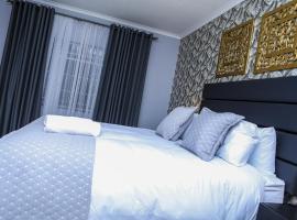 Delux Guesthouse, Hotel in Volksrust