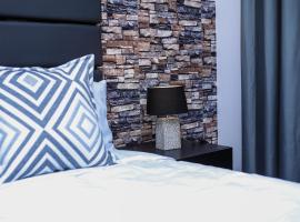 Delux Guesthouse, hotel a Volksrust