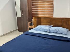 Wayanad Biriyomz Residency, Kalpatta, Low Cost Rooms and Deluxe Apartment, departamento en Kalpetta