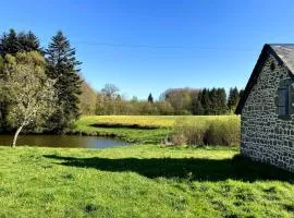 Maison de charme à Joué-du-Bois avec vue sur le lac
