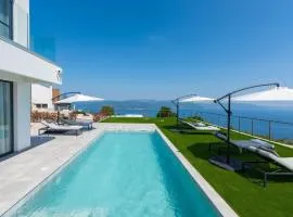 Villa Atrium with heated pool, sea view, jacuzzi, gym and sauna