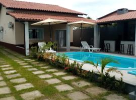 Casa individual com piscina e area gurmet – hotel z basenem w mieście Coroa Vermelha