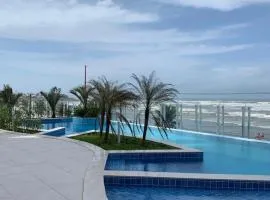 Apartamento pé na areia