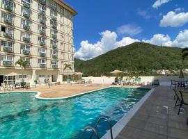 Flat 217 Granja Brasil - Com Piscina Aquecida Em Itaipava, leilighet i Itaipava