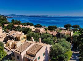 Pebbles and sea at Barbati with shared pool, Hotel in Barbati