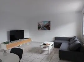 Charmant appartement au rez de jardin d'une maison