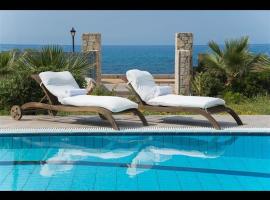 Luxury Villa Beachfront 5 Bedrooms 10-12 Persons, hotel in Analipsi