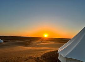 Desert Private Camps -ShootingStar Camp, luxusní stan v destinaci Shāhiq