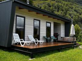 Aysén Lodge - Cabaña con Tinaja, Strandhaus in Puerto Dunn