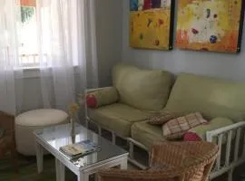 Cozy ,artistic cottage in a garden setting close to the beach and hiking trails.