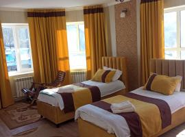 Turan Guesthouse, недорогой отель в Караколе