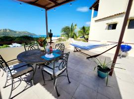 Amazing Oceanview rooftop terrace walk to beach, departamento en Coco