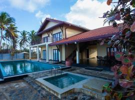 Reef Bungalow Private Villa, 4 bedrooms, hotel with pools in Bopitiya