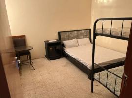 Gulf building, homestay, B&B/chambre d'hôtes à Charjah