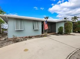 Home on water with pool/lanai kitchen/walk to beach