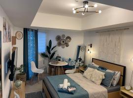 Cozy Studio Unit at Azure North San Fernando Pampanga, ξενοδοχείο με πισίνα σε San Fernando